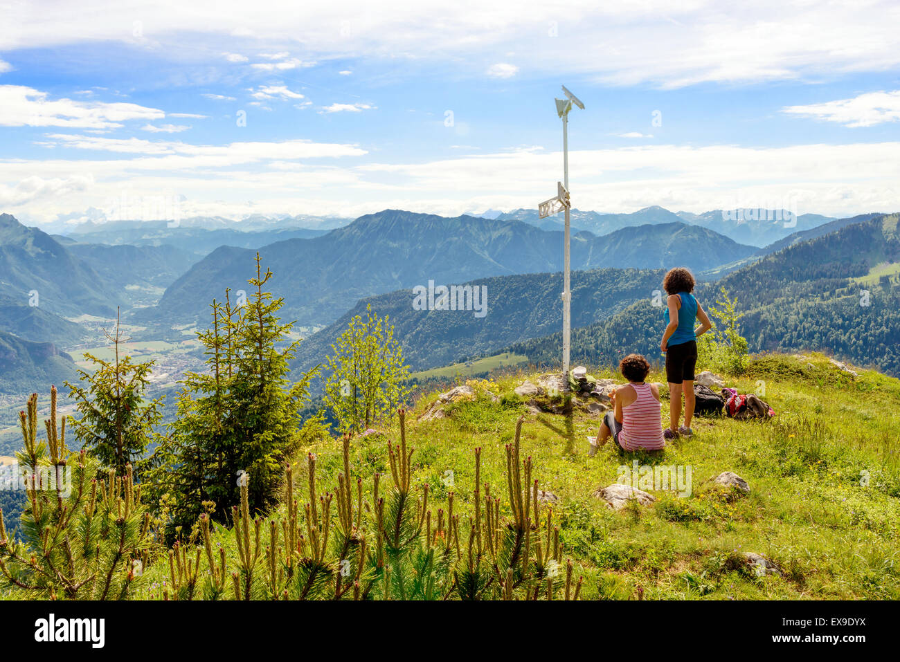 Two hikers women walking in the french ALPS Stock Photo - Alamy