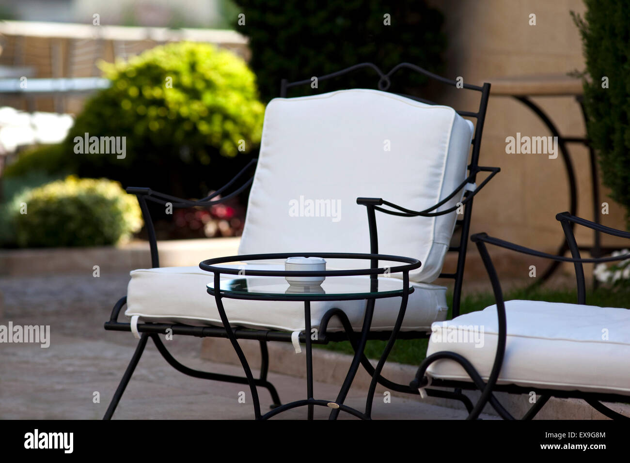 Stylish garden furniture in a charming French garden Stock Photo Alamy