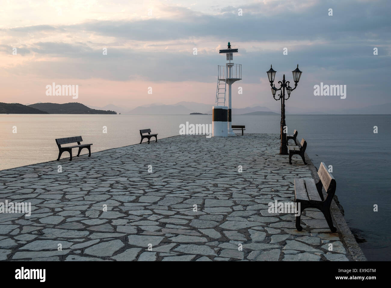 Greek Sunset at Vonitsa in the Amvrakikos Gulf. Stock Photo