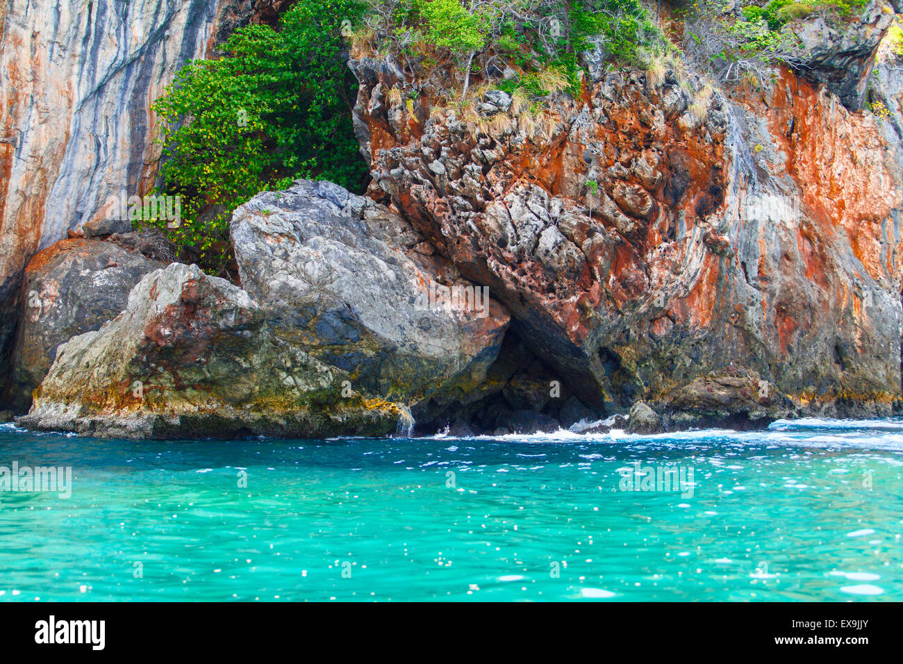 Rock island and red stones on blue tropical sea, Philippines Boracay ...