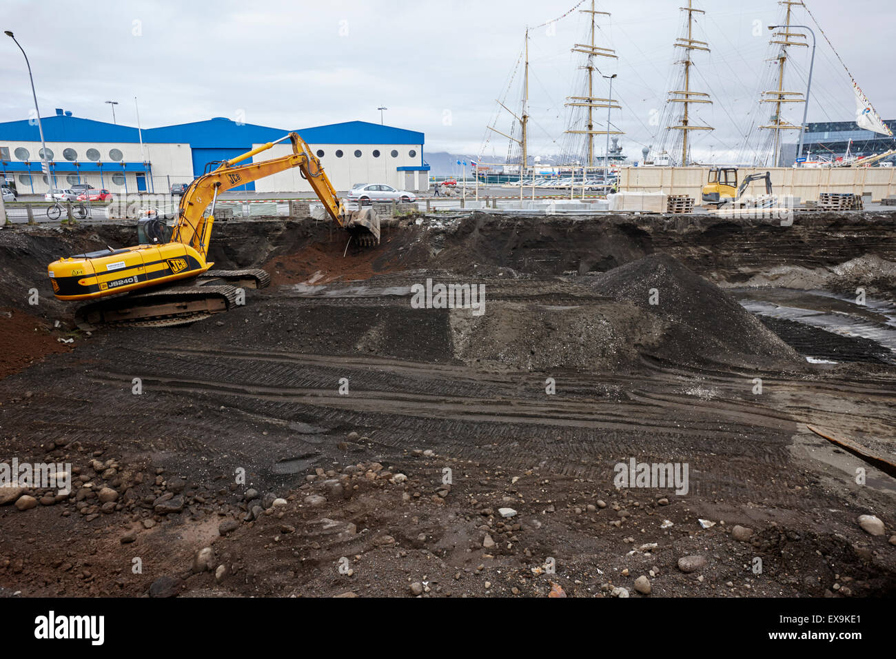 new building groundwork excavation through layers of volcanic material harbour reykjavik iceland Stock Photo