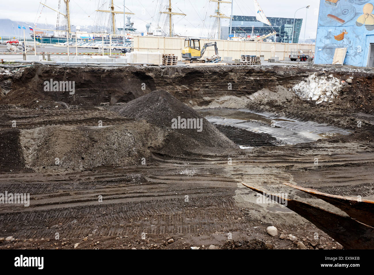 new building groundwork excavation through layers of volcanic material harbour reykjavik iceland Stock Photo