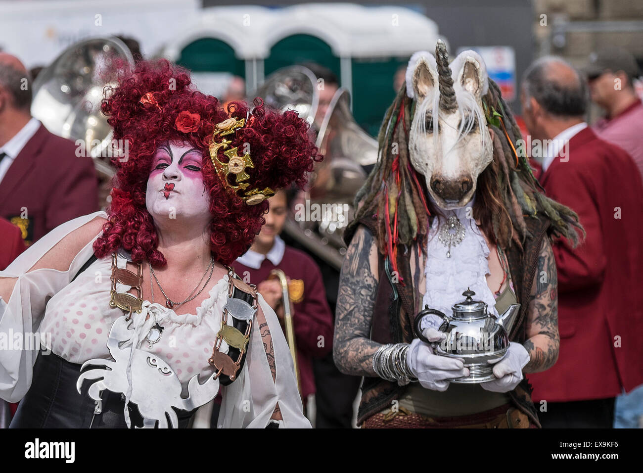 Two colourful characters leading the Civic Parade on Mazey Day, part of the Golowan Festival in Penzance, Cornwall. Stock Photo