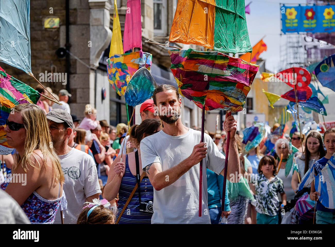 Children and adults participate in colourful parades on Mazey Day, part of the Golowan Festival in Penzance, Cornwall. Stock Photo
