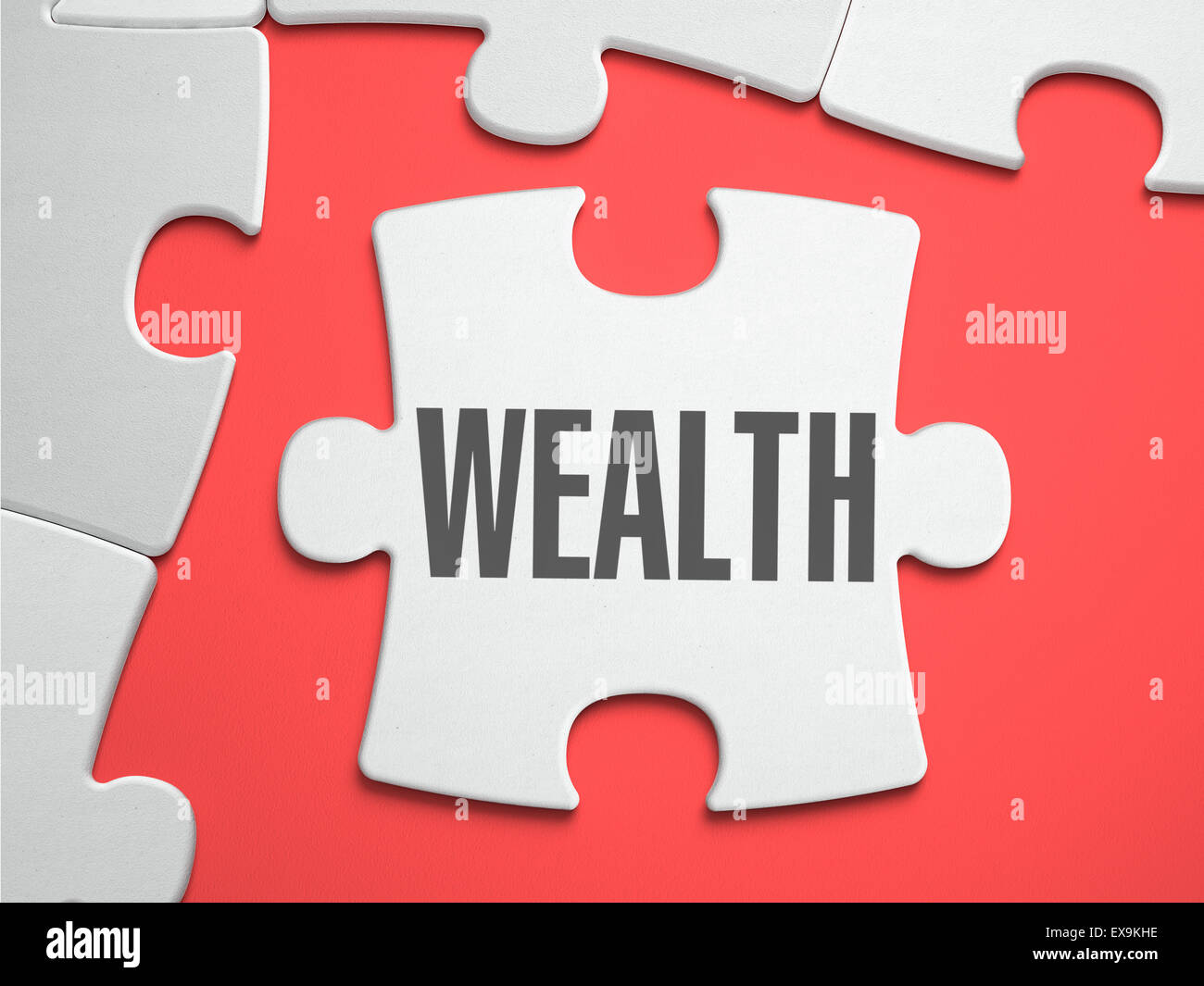 Wealth - Puzzle on the Place of Missing Pieces. Stock Photo