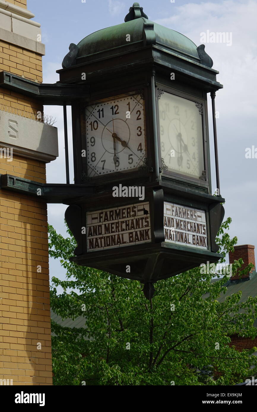Antique clock at the corner of the Farmers and Merchants National Bank building, Old Town pedestrian mall, Winchester, Virginia Stock Photo