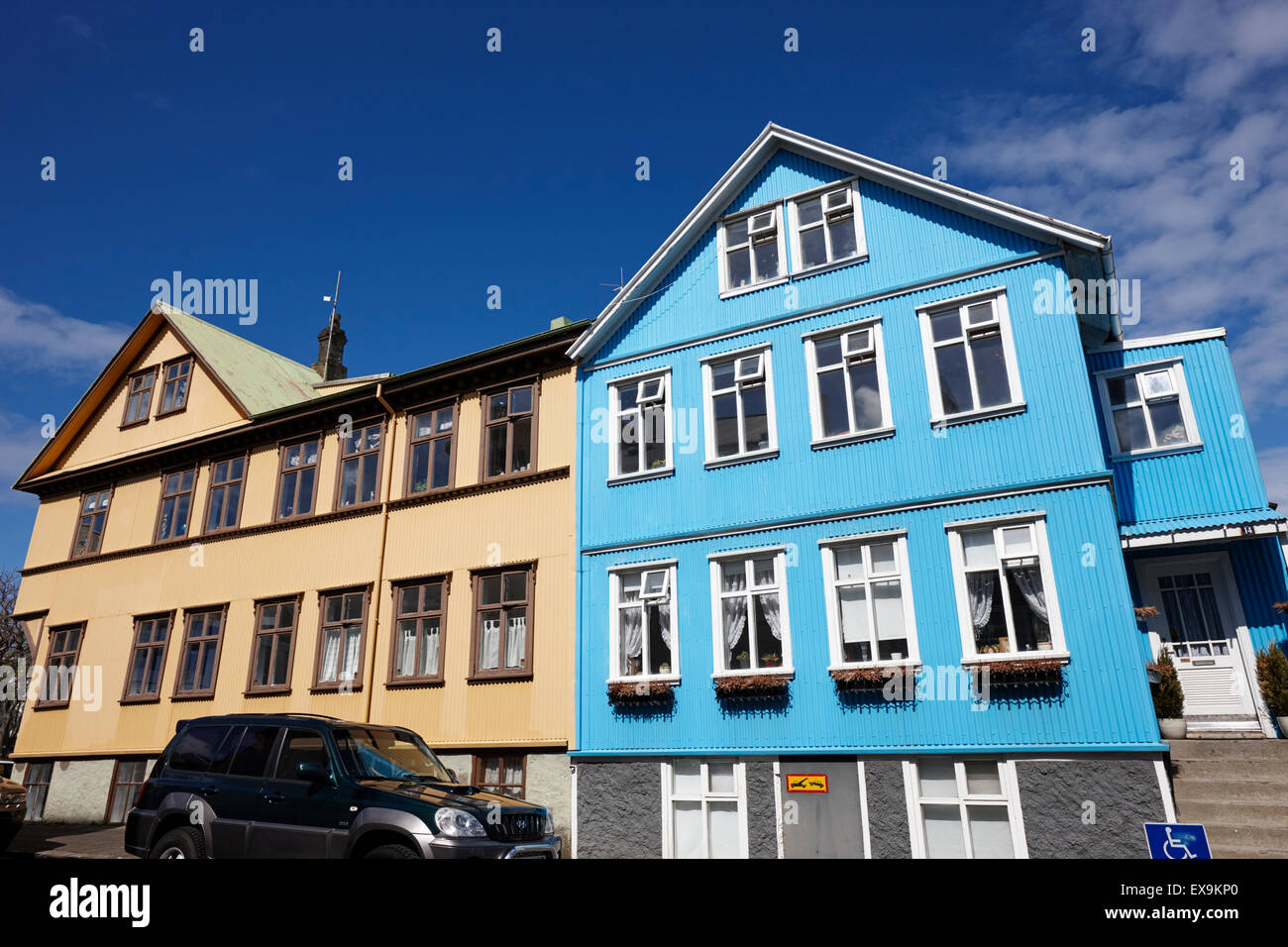 multi storey brightly painted corrugated iron clad buildings reykjavik iceland Stock Photo
