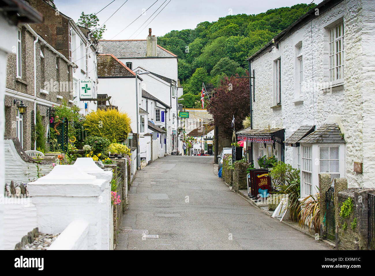 Cottages in a quaint street in the picturesque Cornish Polperro fishing village in Cornwall. Stock Photo
