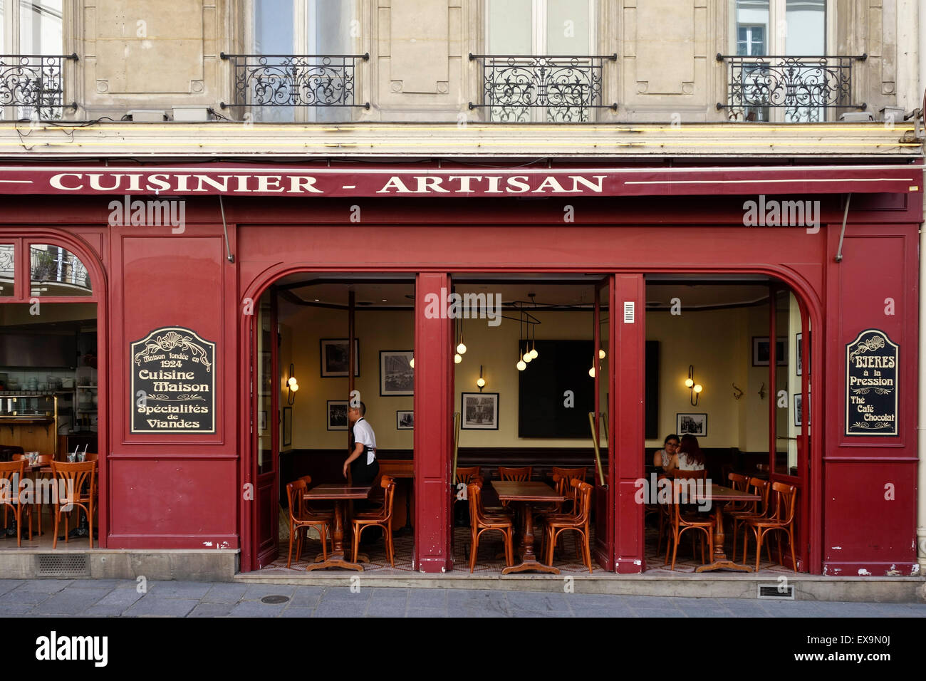 Typical French corner cafe, Cafe des musees, brasserie, restaurant, bar, Le Marais, Paris, France. Stock Photo