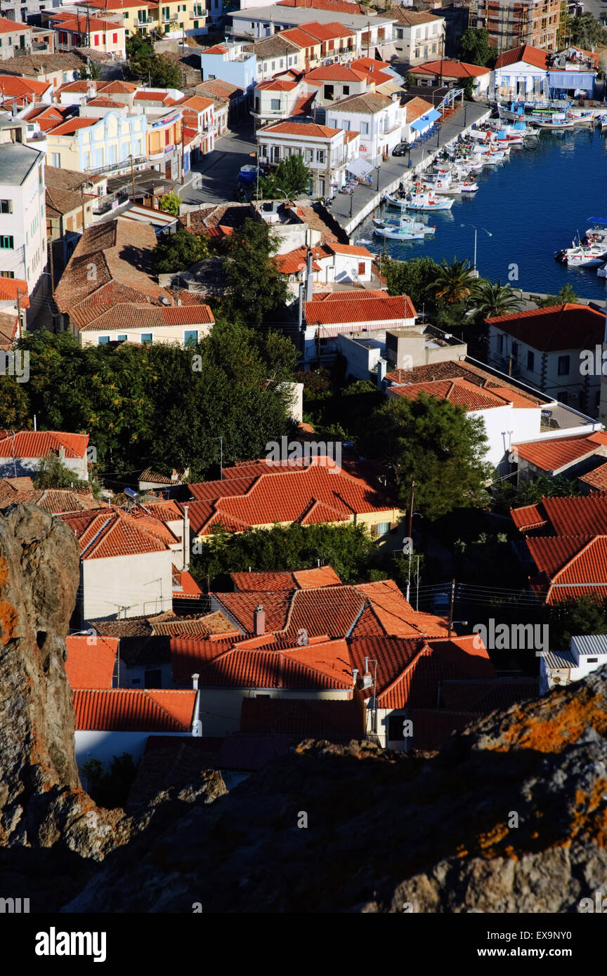 Red rooftops houses in Myrina city and traditional quay. Lemnos or