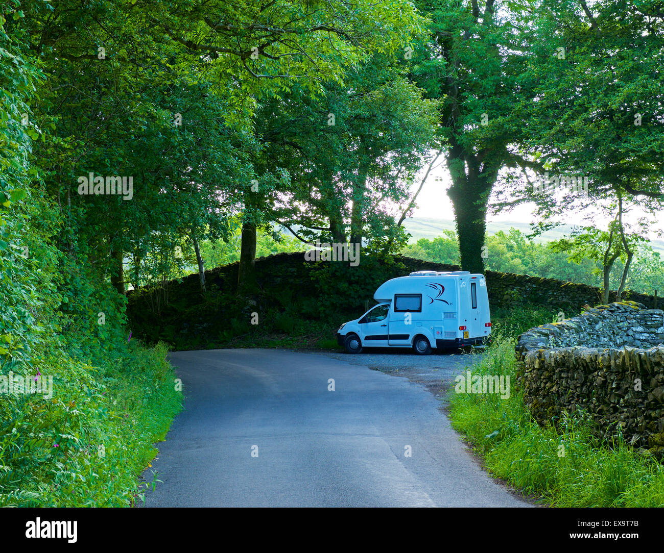 Romahome 25 small motorhome parked by road, Troutbeck Valley, Lake District National Park, Cumbria, England UK Stock Photo