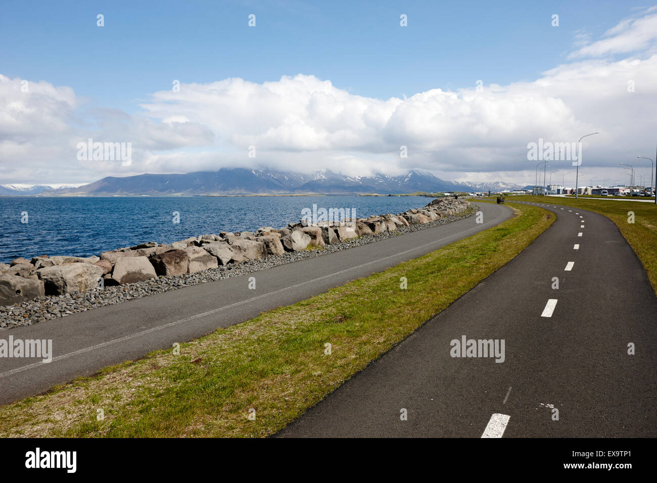 footpath and cycle path on saebraut sea coastal road reykjavik iceland Stock Photo