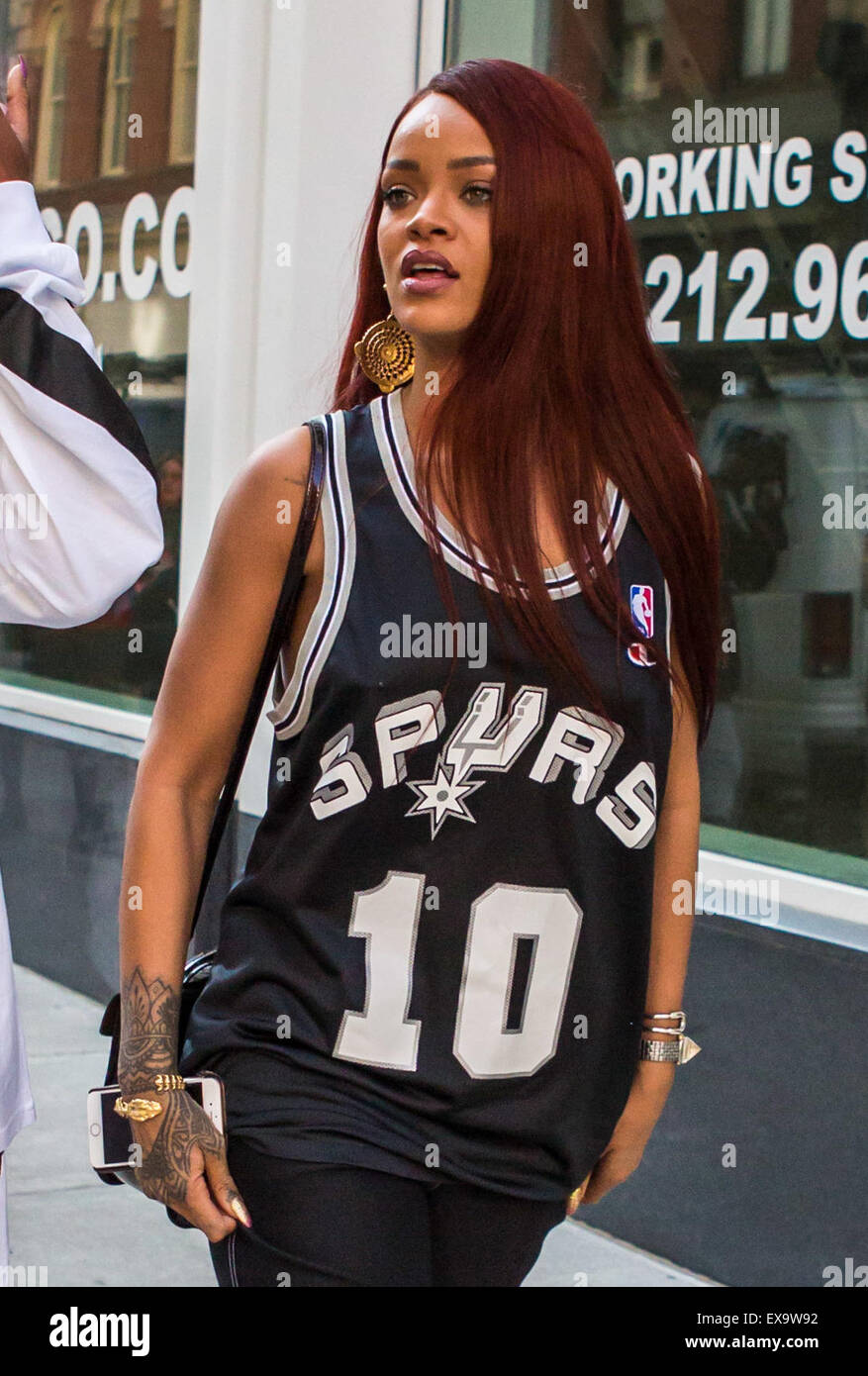 Rihanna wears a San Antonio Spurs jersey while out shopping on SoHo with a  friend Featuring: Rihanna Where: New York City, New York, United States  When: 08 May 2015 Stock Photo - Alamy