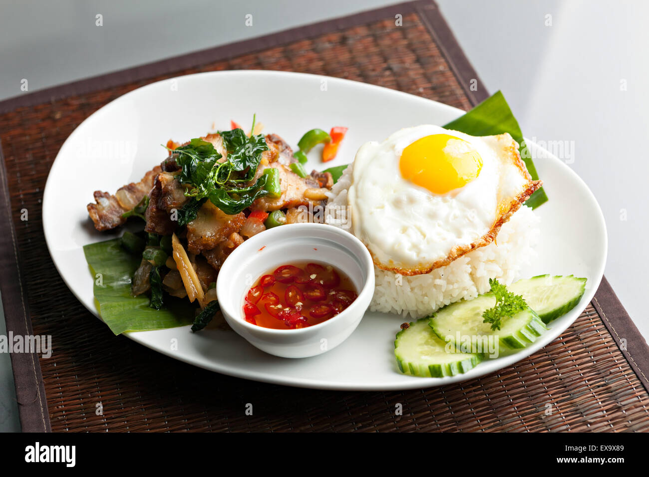 Thai Crispy Pork with Fried Egg Stock Photo