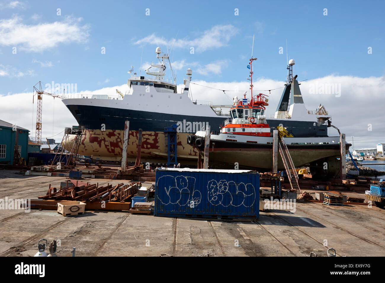 boats and ship in dry dock in reykjavik harbour iceland Stock Photo