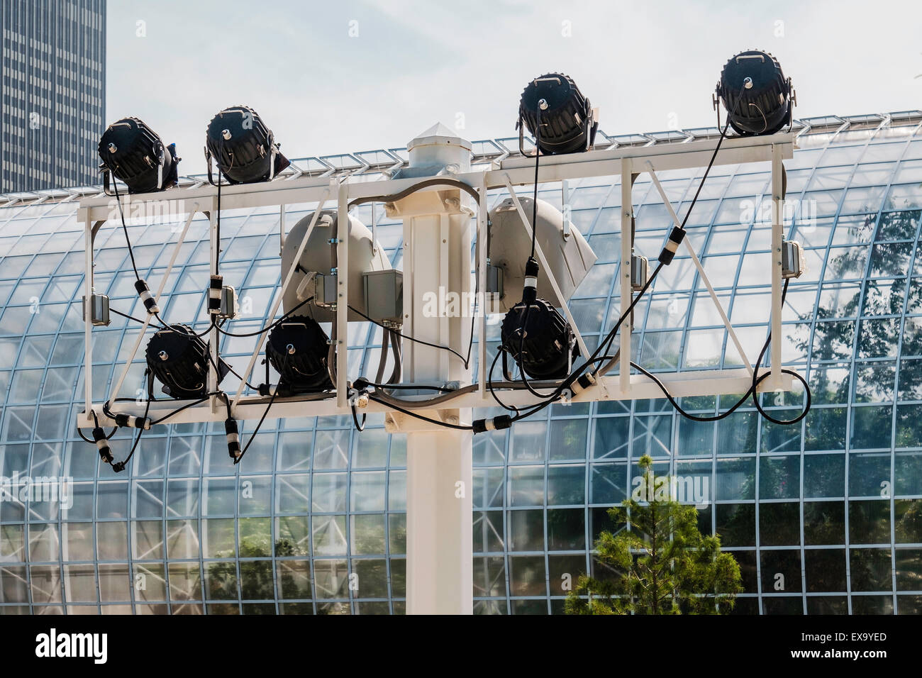 A set of spotlights on a sturdy pole and frame, meant to light up the Crystal Bridge, a tropical conservatory in Oklahoma City, USA Stock Photo