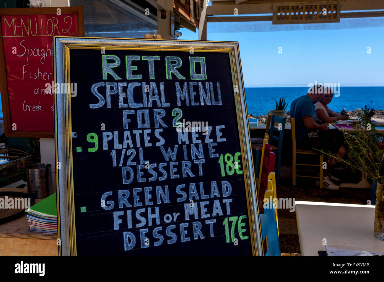 Sea view Tavern in Rethymno Crete bar menu Greek Island, Greece Stock Photo