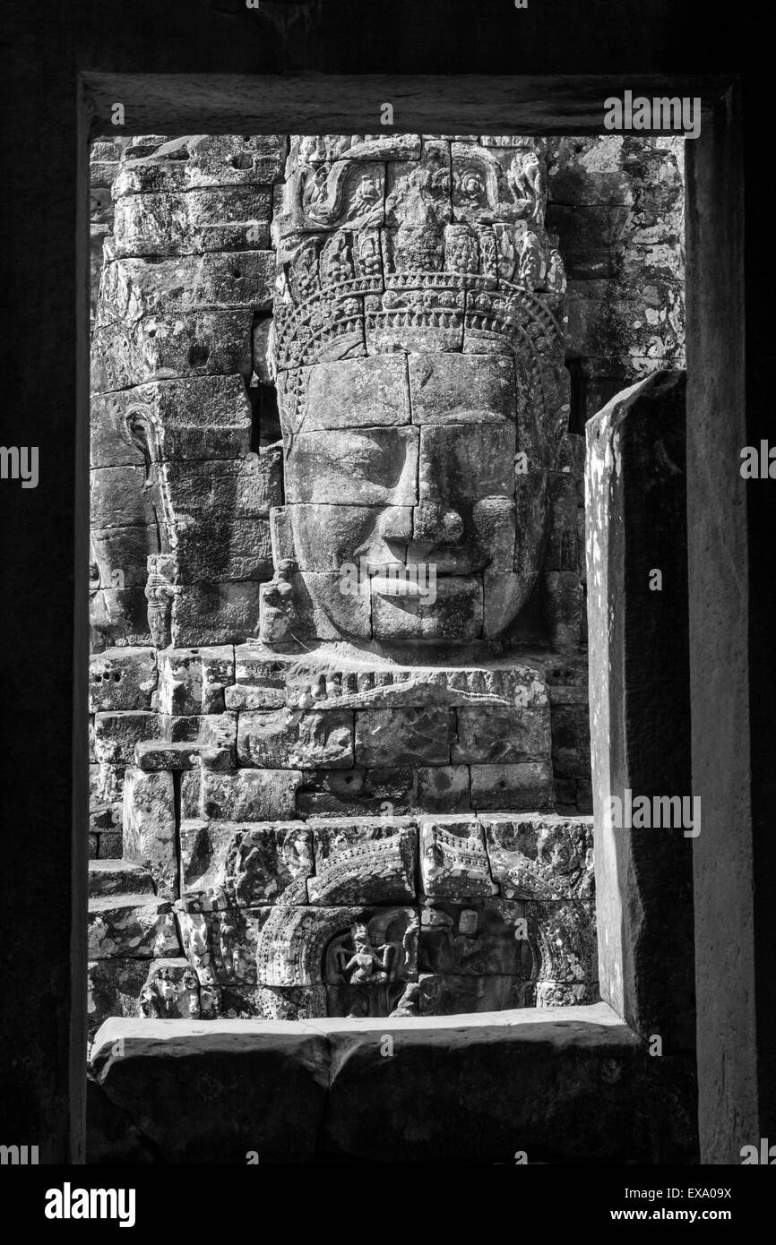 Asia, Cambodia, Siem Reap, Stone carvings of the 12th century Buddhist King Jayavarman VII at Bayon Temple at Angkor Wat Stock Photo