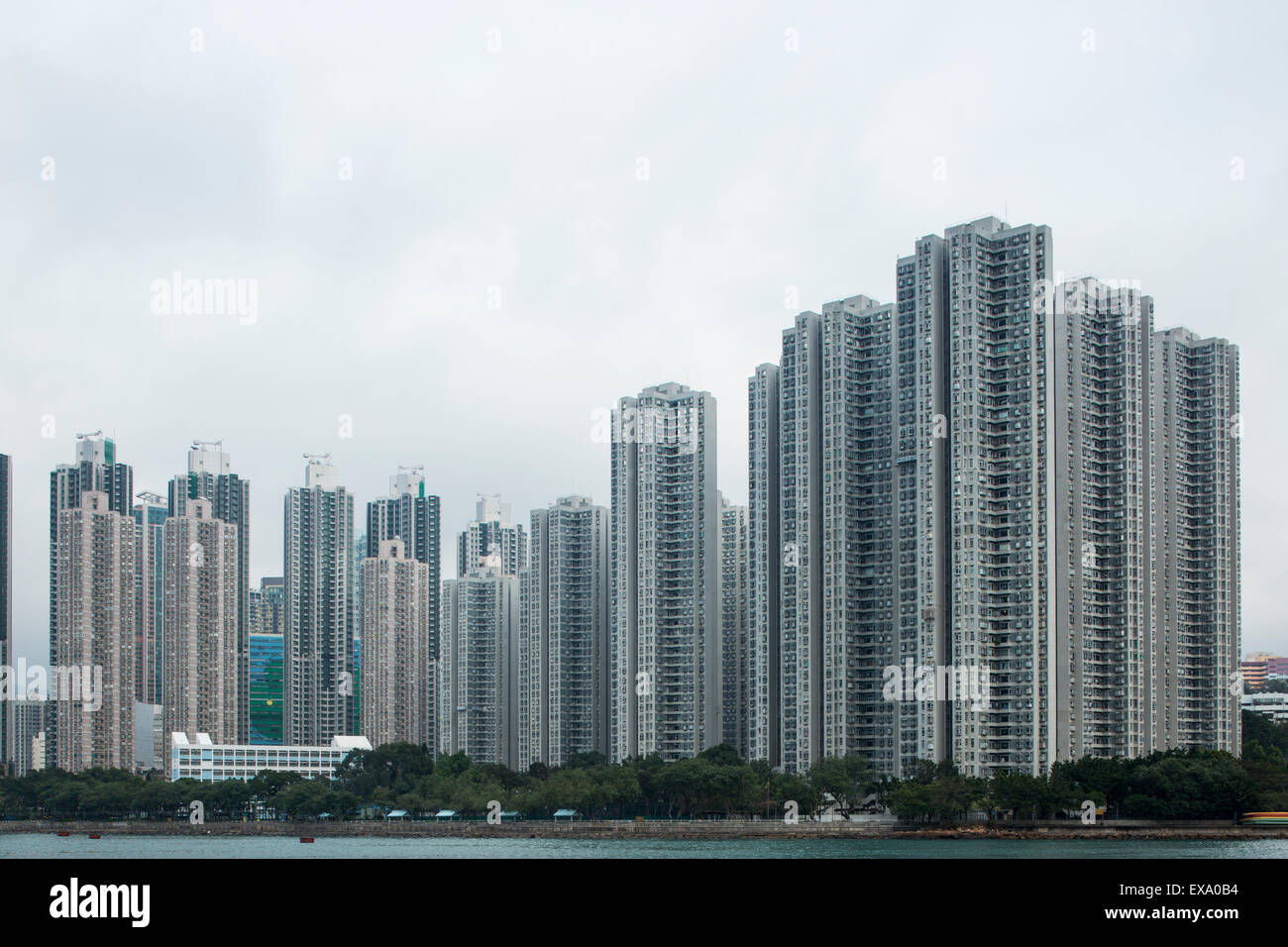 China, Hong Kong, Row of apartment towers lining bay on Tsing Yi Island