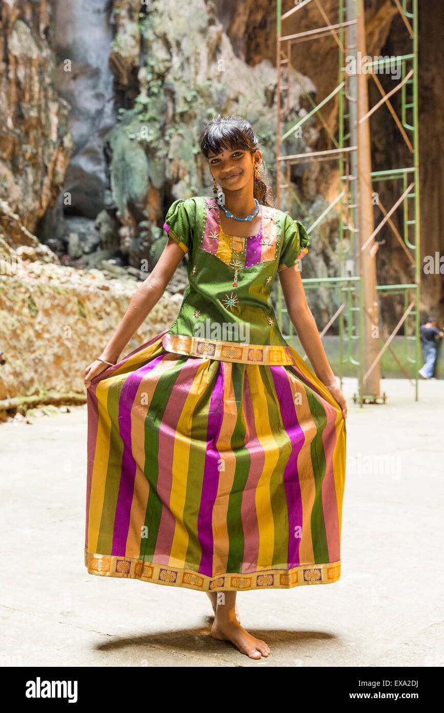 asia malaysia kuala lumpur young girl poses for snapshots inside shrine EXA2DJ