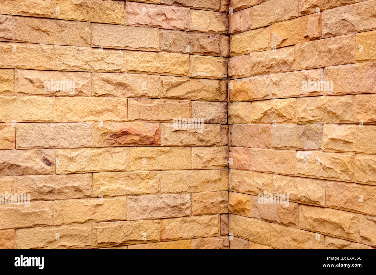 A brick wall in different natural orange tones Stock Photo