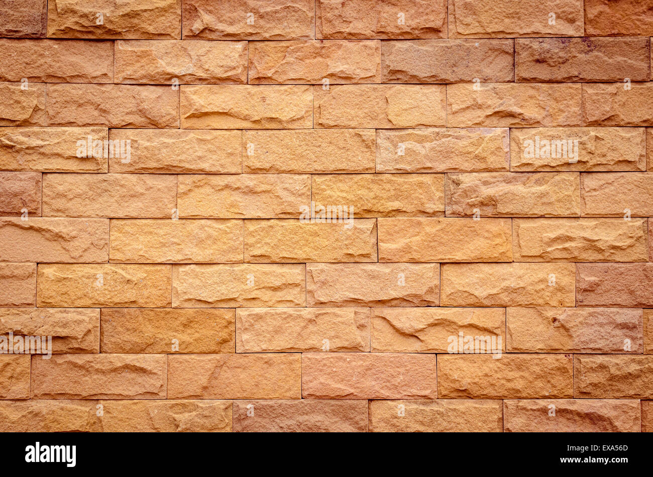 A brick wall in different natural orange tones Stock Photo