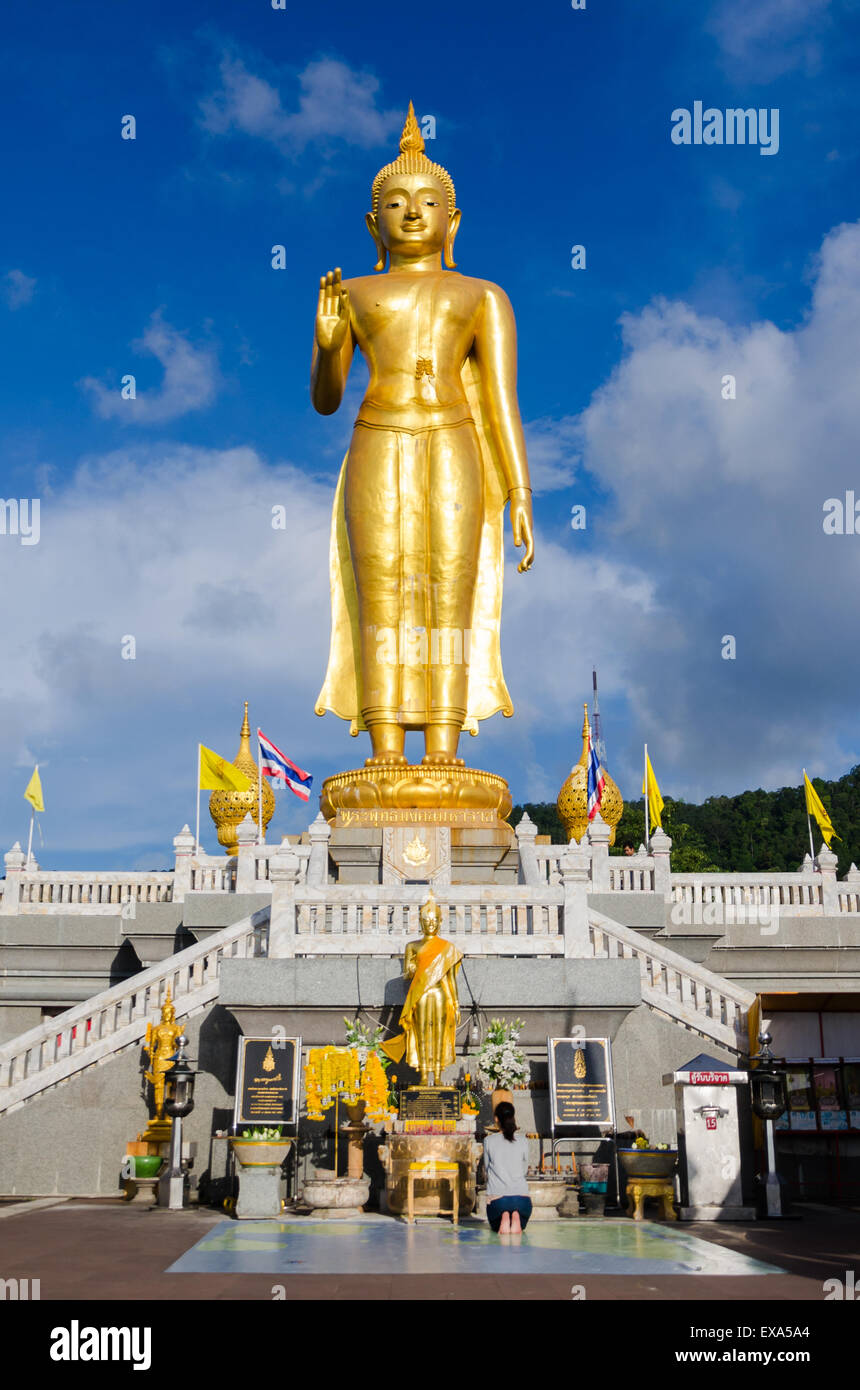 Statue standing buddha in Hatyai city, province Songkhla , Thailand Stock Photo