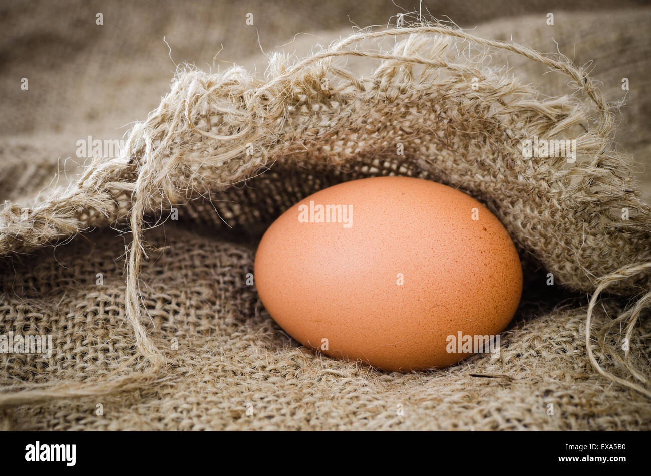 Chicken egg of Still Life on Linen. Stock Photo