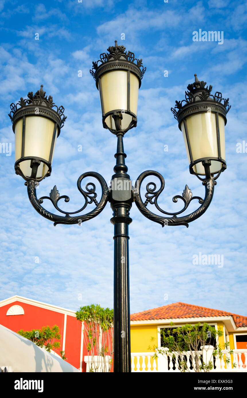 Vintage street lamp post on blue sky Stock Photo