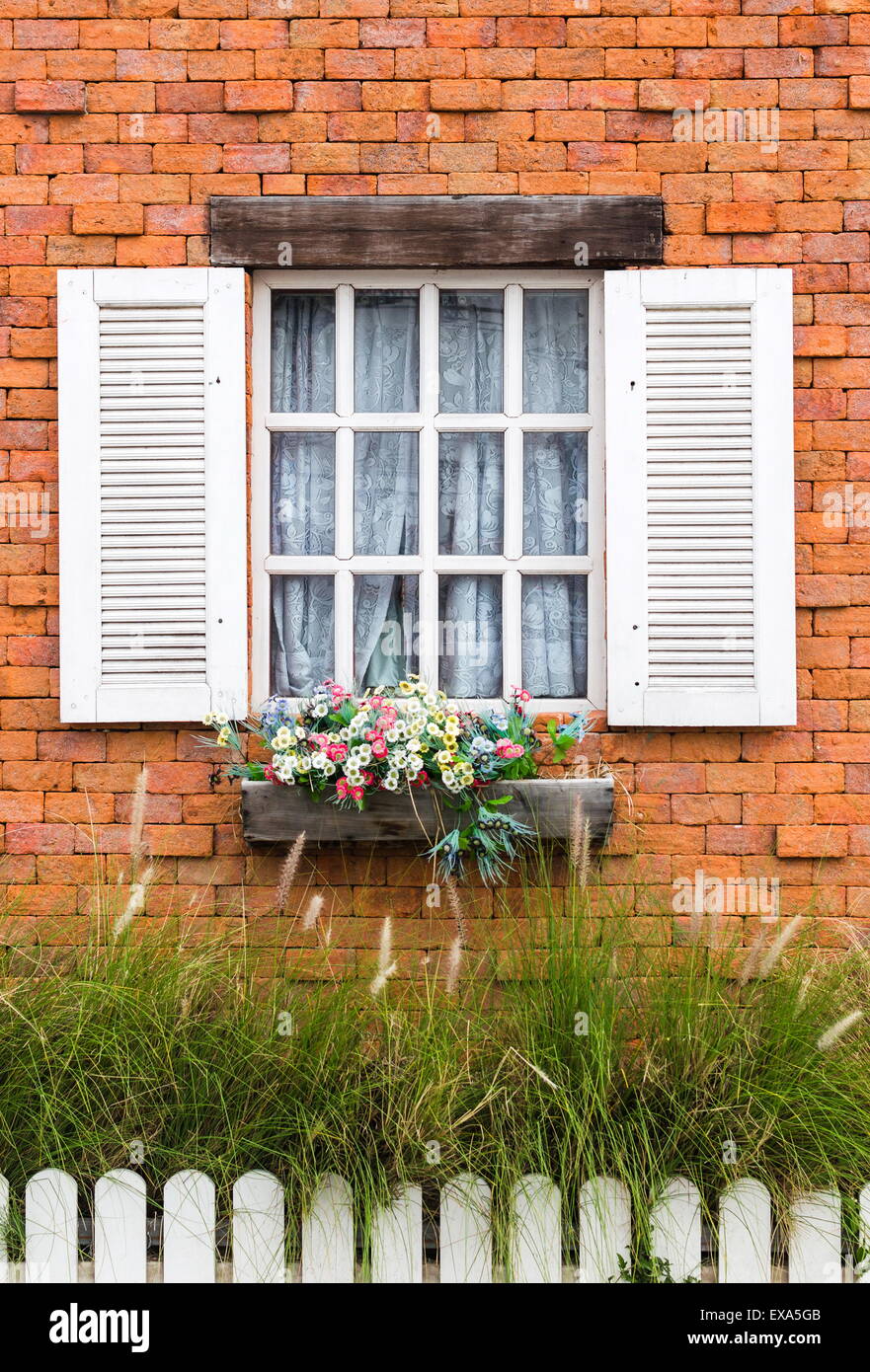Vintage  window on brick wall Stock Photo