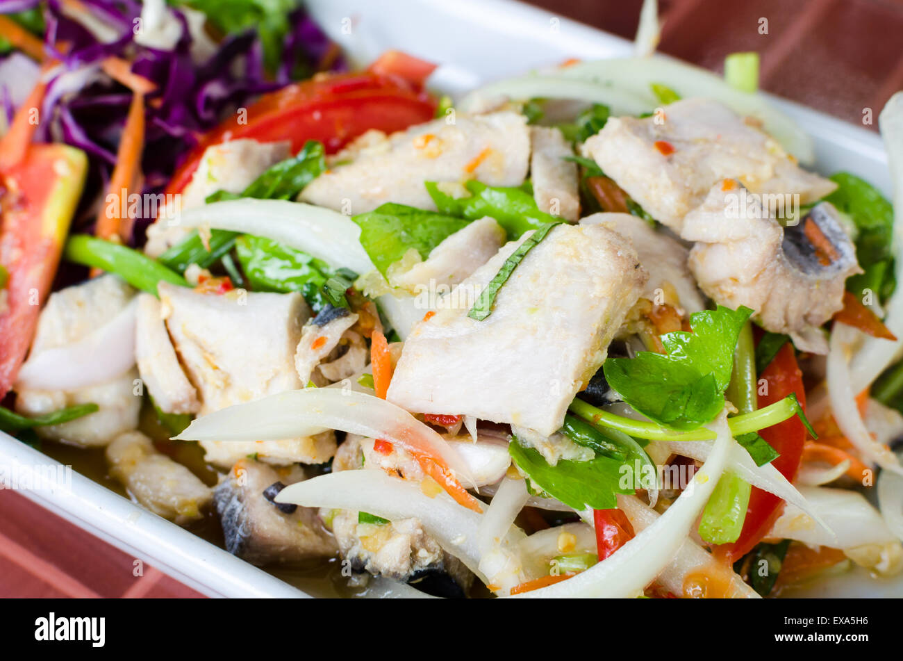 Spicy mackerel salad mix with onion, chili, coriander and lime juice. spicy sweet sour flavor. Stock Photo