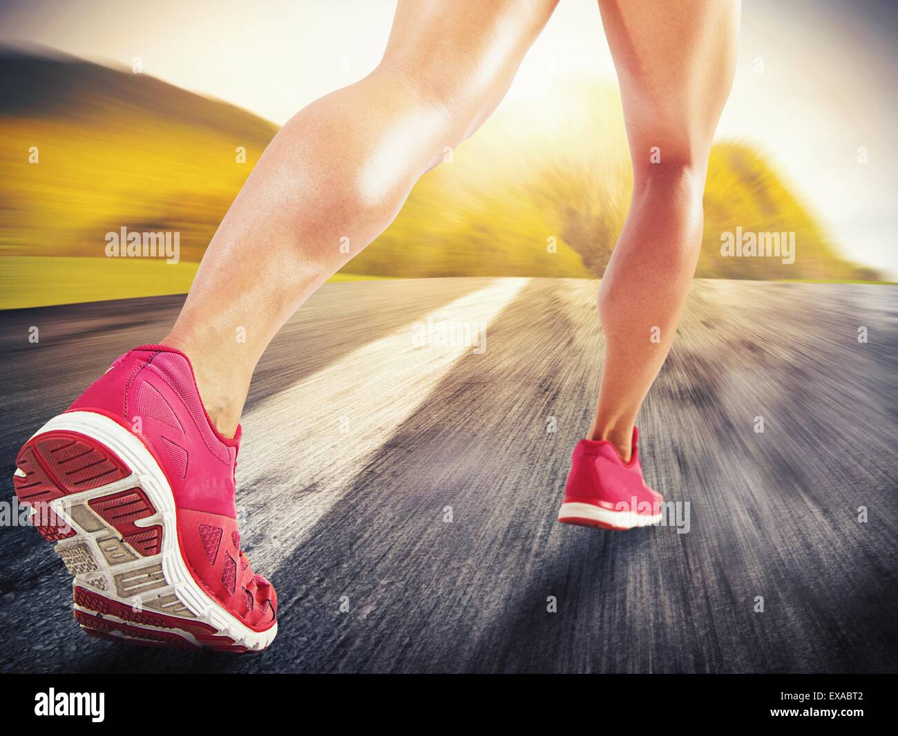 Running on asphalt Stock Photo Alamy