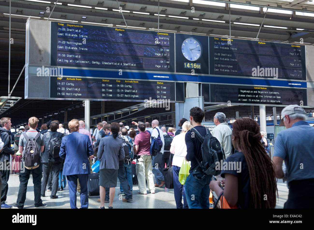 People checking times at a train station during London tube strike 9th July 2015 - St Pancras Station Stock Photo
