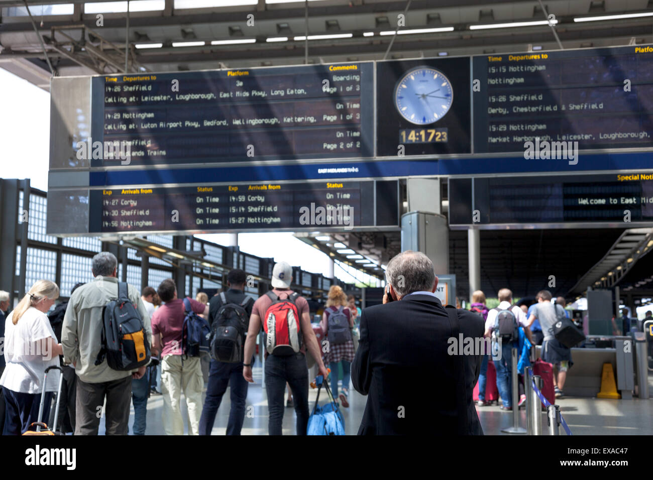 People checking times at a train station during London tube strike 9th July 2015 - St Pancras Station Stock Photo