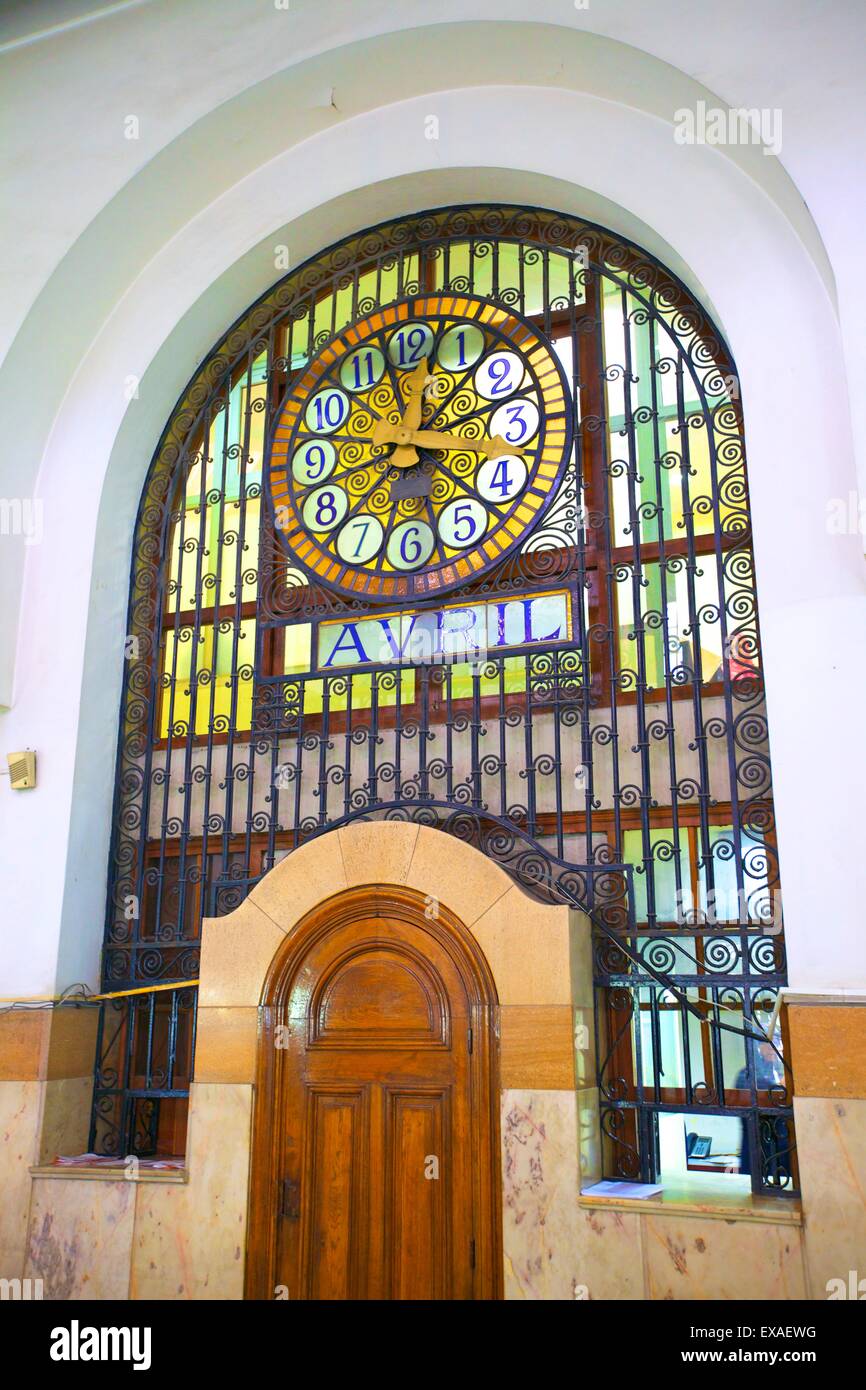1919 Art Nouveau Post Office Building interior with stained glass window and clock, Casablanca, Morocco, North Africa, Africa Stock Photo