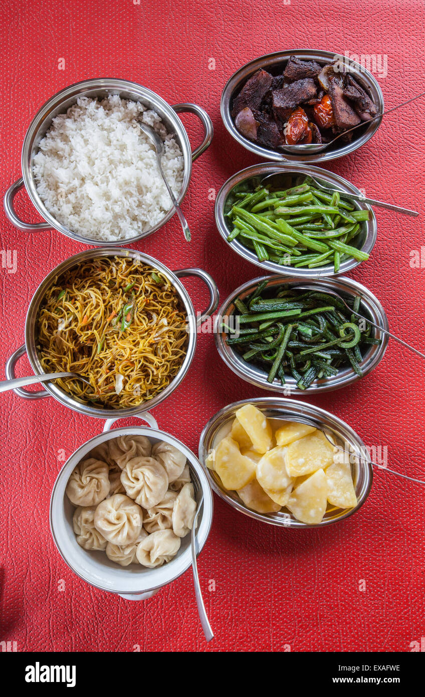 Bhutanese dishes served at a restaurant in Thimphu rice and vegetables including chilli, Bhutan, Asia Stock Photo