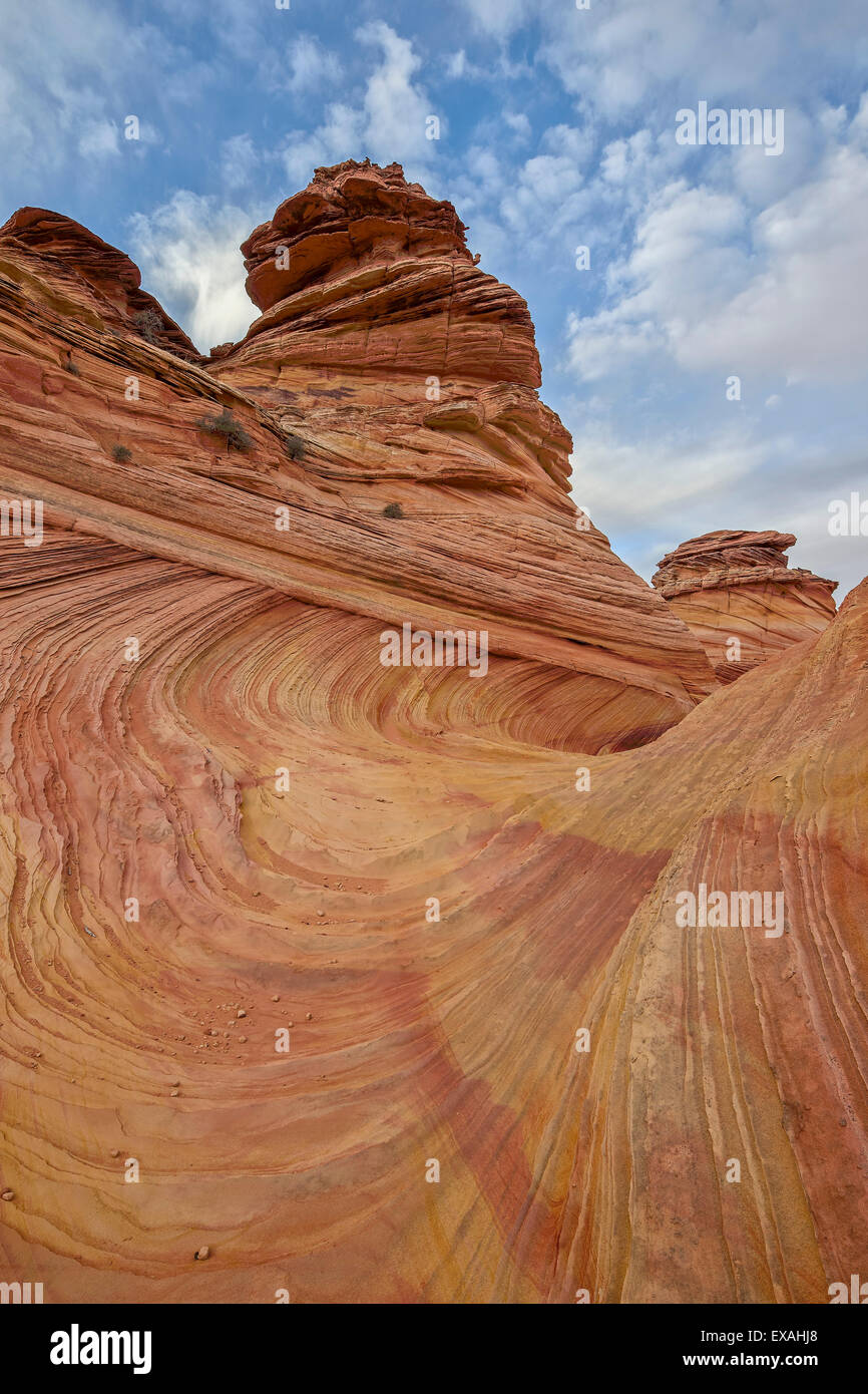 Sandstone Wave And Cones Under Clouds Coyote Buttes Wilderness sandstone-wave-and-cones-under-clouds-coyote-buttes-wilderness