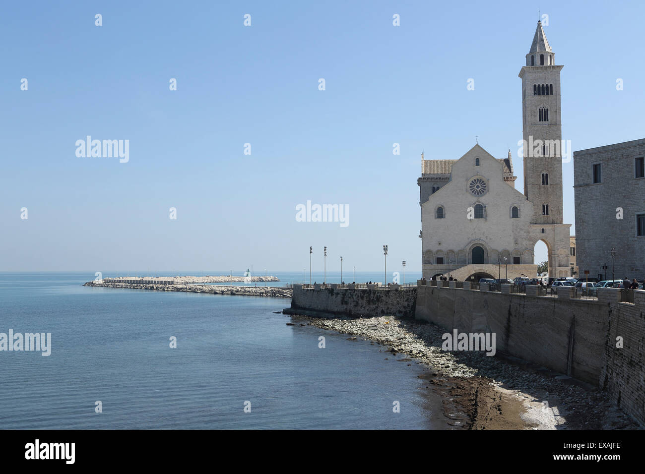 The Adriatic Sea, harbour wall and Cathedral of St. Nicholas the Pilgrim (San Nicola Pellegrino) in Trani, Apulia, Italy, Europe Stock Photo