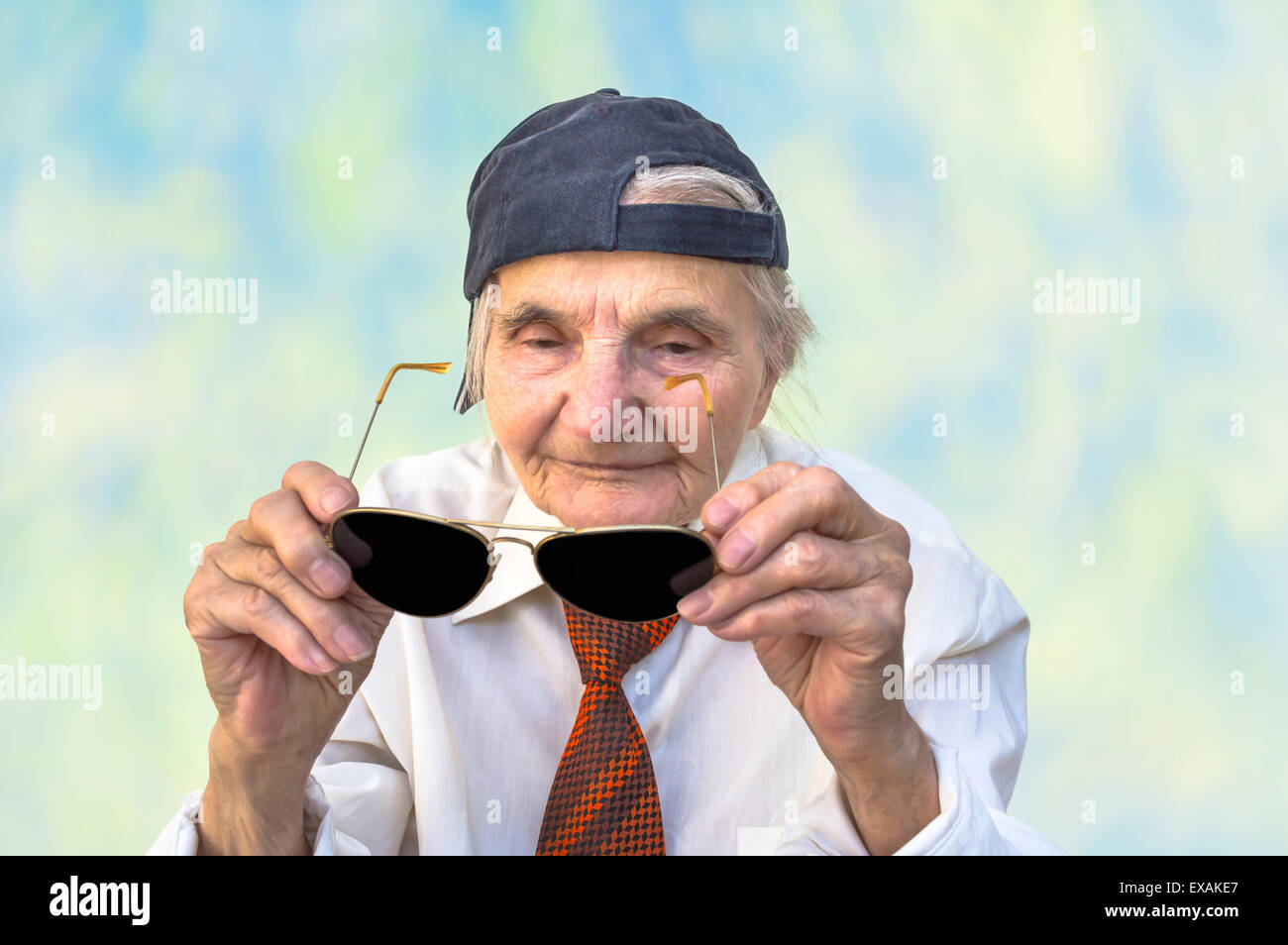 Funny elderly woman with eyeglasses. Selective focus. Stock Photo