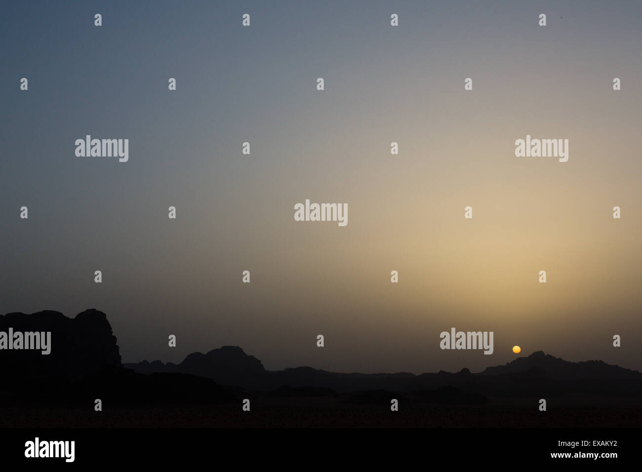 Wadi Rum, Jordan. Sunset over the desert at Wadi Rum. Stock Photo