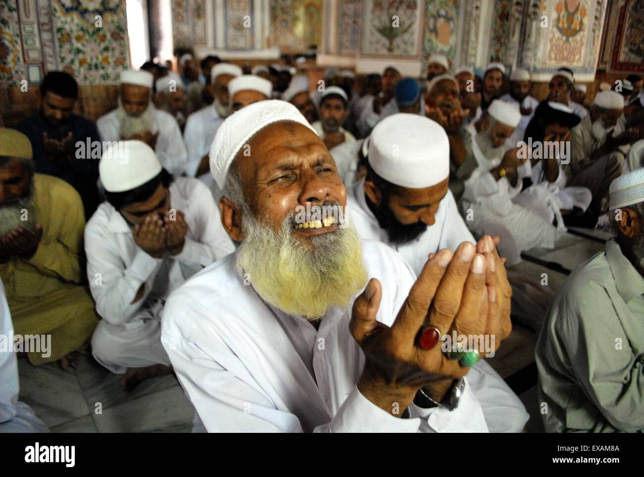 Pakistan Muslam Peshawar. 10th July, 2015. A Pakistani Muslim offers Friday prayers at ...