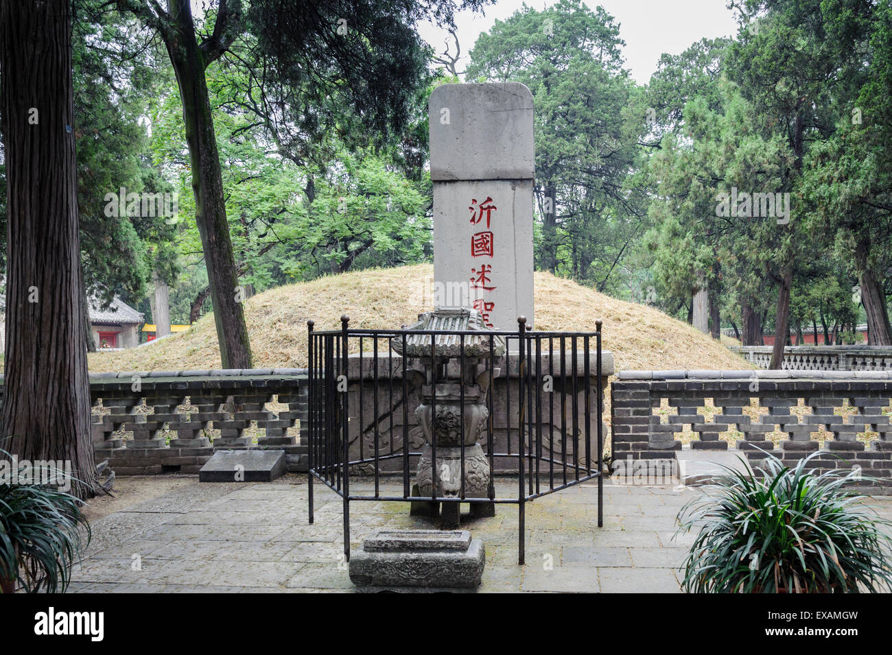 Kong Forest where Confucius tomb is and where his ancestors are buried. This is one of the burial mounds of one of his clan. Stock Photo