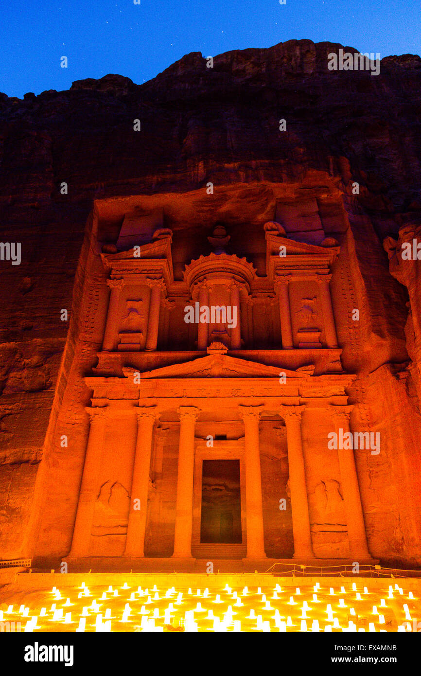 Petra, Jordan, 8th June. Incredible view of the Treasury at Petra. Viewed at night, the temple is illuminated by candles three t Stock Photo