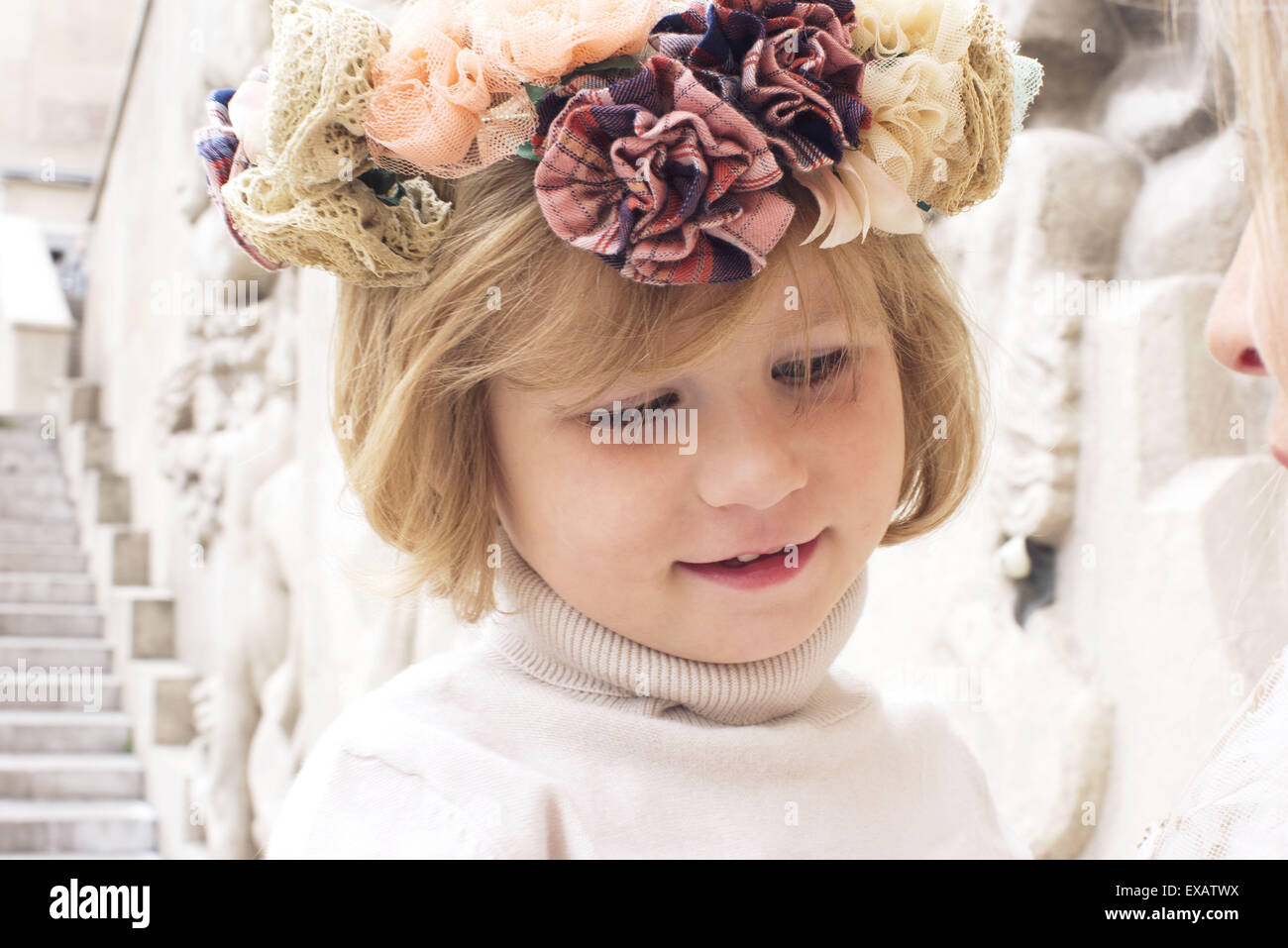 Little girl wearing flower wreath, portrait Stock Photo