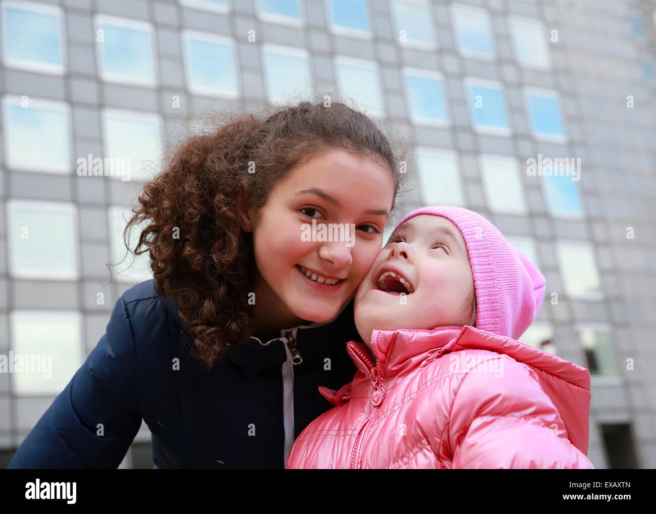 Happy family moments - Young girls having fun Stock Photo