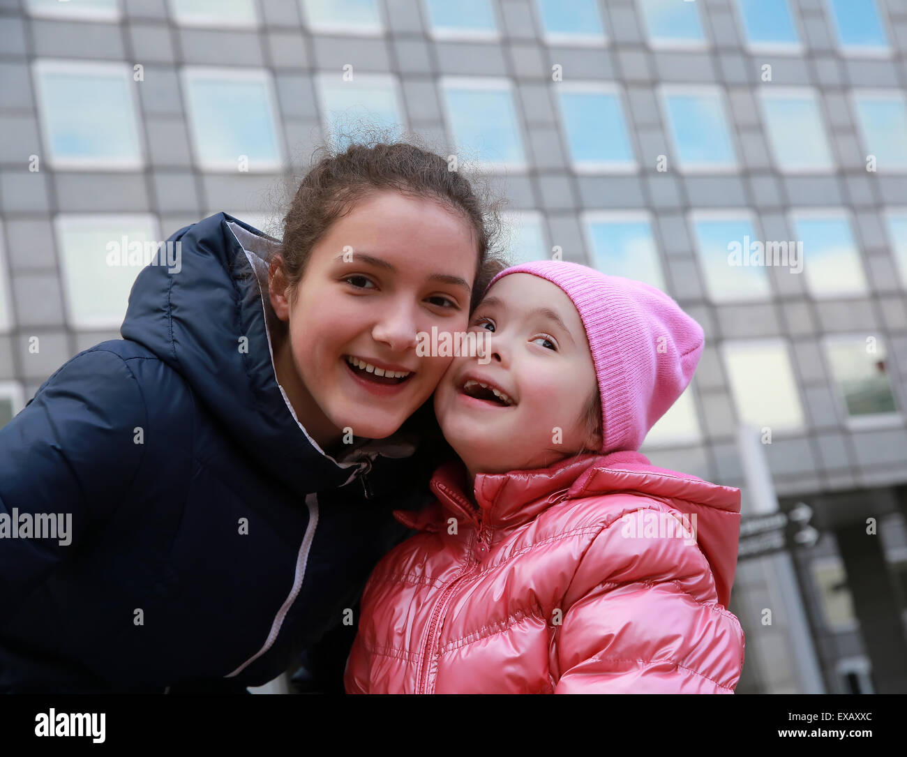 Happy family moments - Young girls having fun Stock Photo
