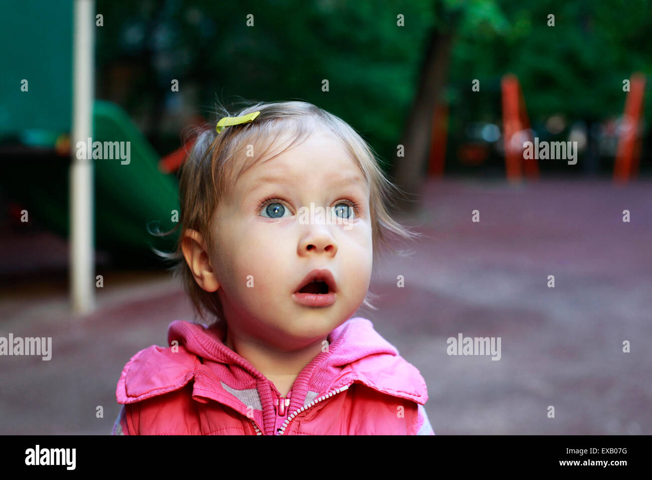 Portrait of a surprised little girl Stock Photo - Alamy