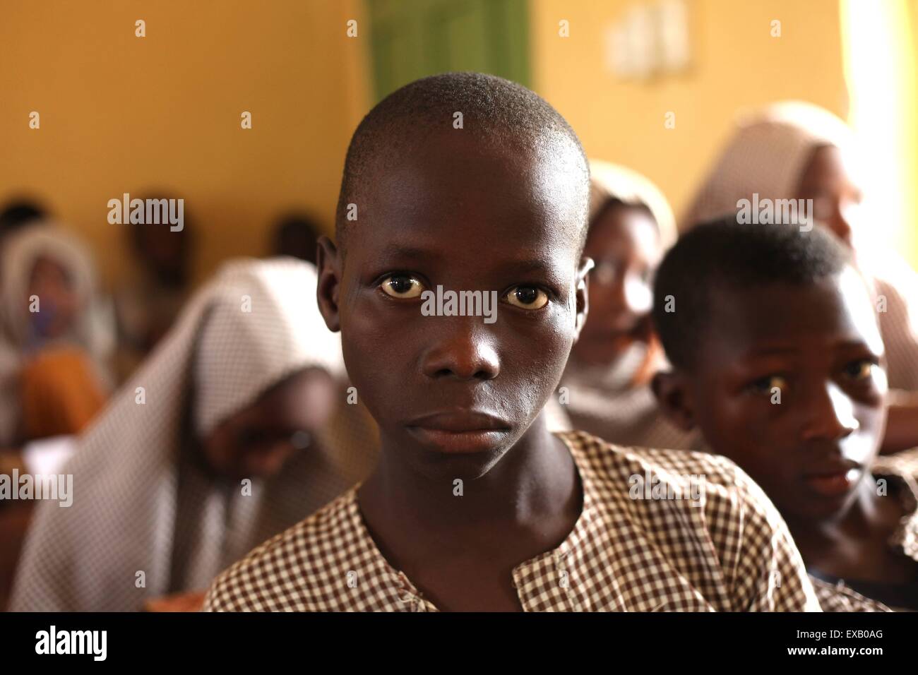 Children attending examen in Islamic school in Nigeria Stock Photo - Alamy