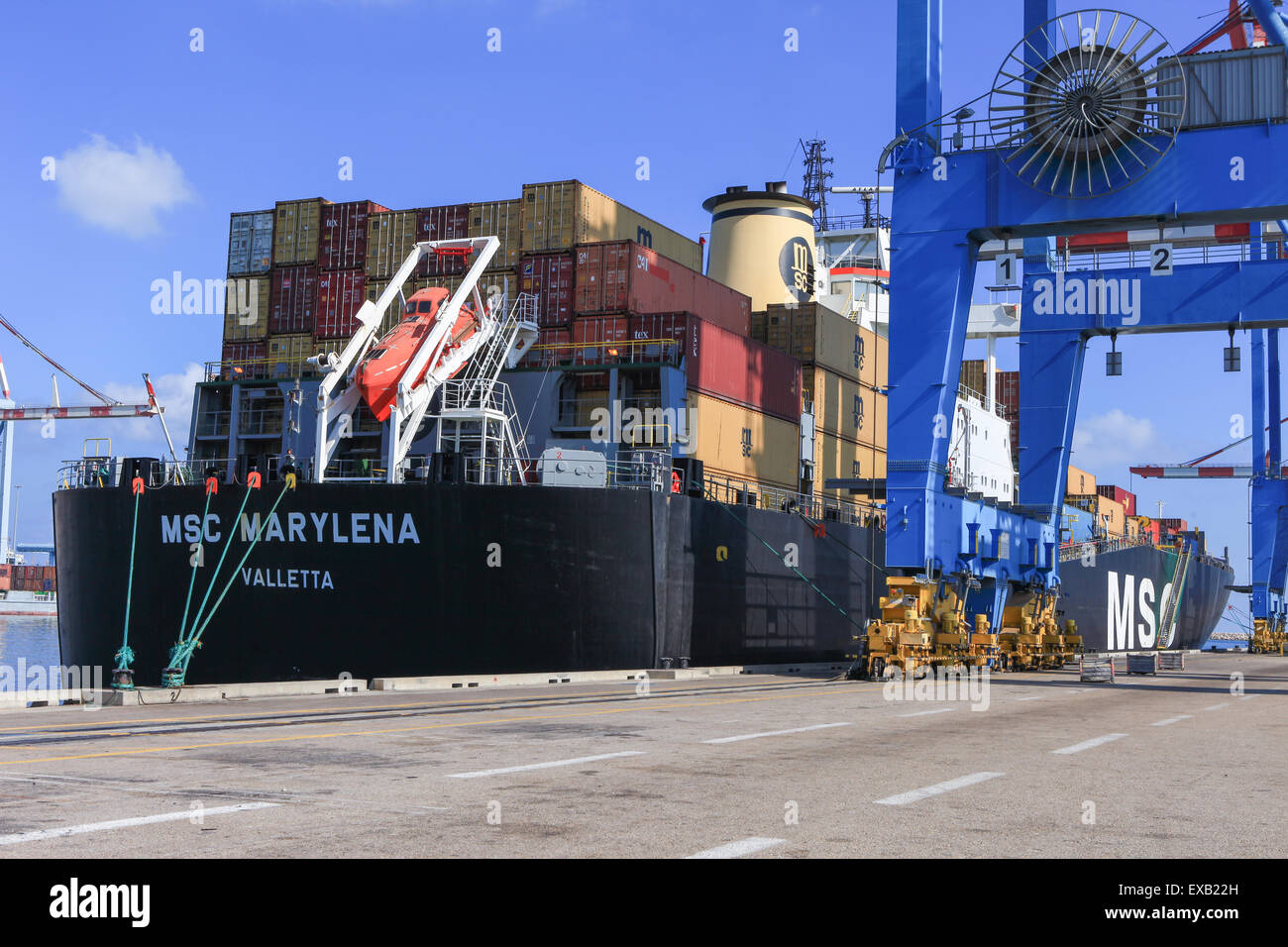 International Mega Container ship unloading containers on service ...