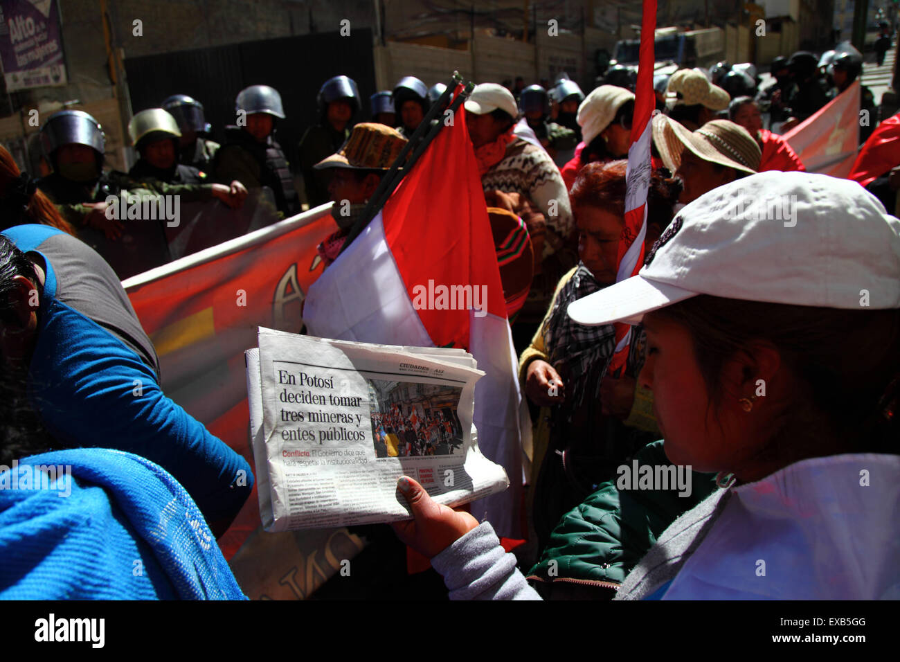 La Paz, Bolivia, 10th July 2015. A protestor from Potosi reads a